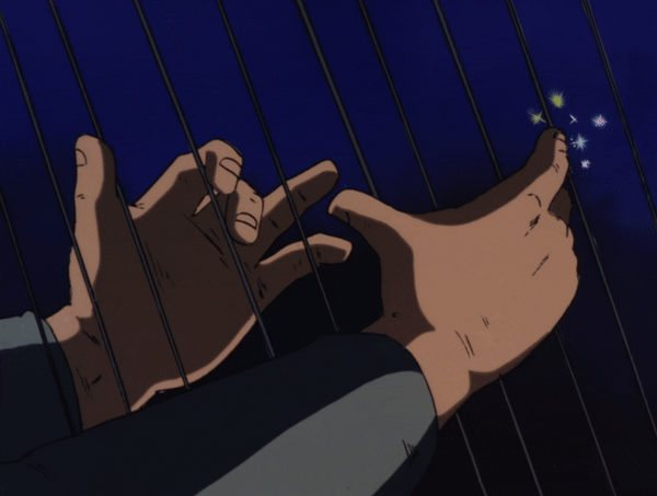 Hand playing a harp.