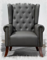 Giant steel reinforced, tufted leather gentleman's chair.